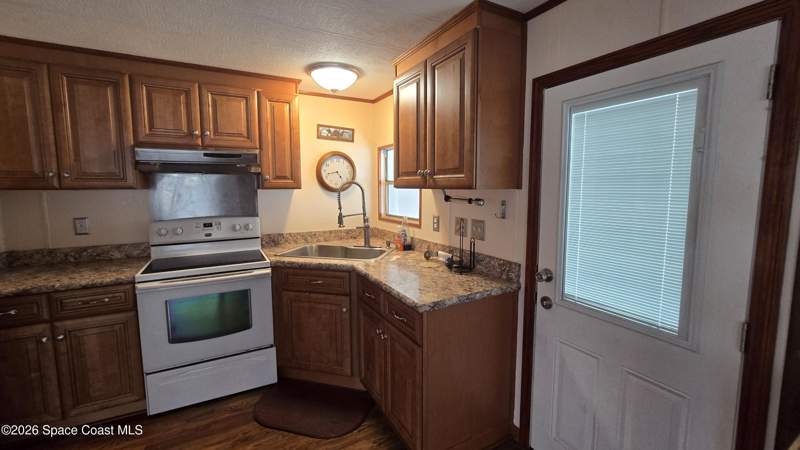 2 bedroom Manufactured Home at 861 Pecan Circle, Barefoot Bay Unit 2 Part 12, Barefoot Bay — photo 4