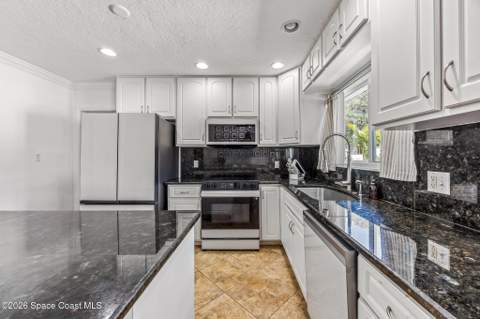 104 W Alachua Lane, Cocoa Beach FL - photo 10 of 54