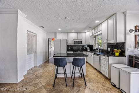 104 W Alachua Lane, Cocoa Beach FL - photo 12 of 54