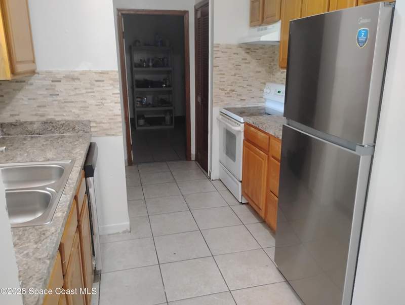 4 bedroom Single Family Residence at 1533 Emerson Drive, Port Malabar Unit 9, Palm Bay — photo 5