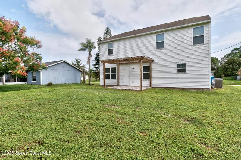 4 bedroom Single Family Residence at 986 Aurelia Avenue, Port Malabar Unit 12, Palm Bay — photo 4
