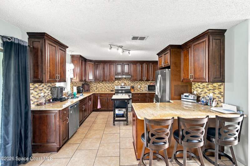 4 bedroom Single Family Residence at 1015 Flower Street, Port Malabar Unit 42, Palm Bay — photo 3