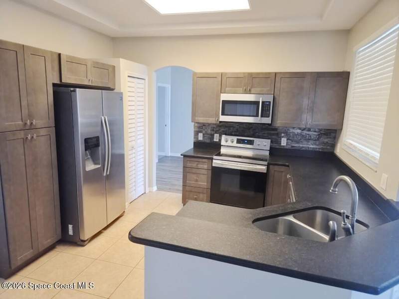 3 bedroom Single Family Residence at 1052 Hutchins Street, Port Malabar Unit 11, Palm Bay — photo 2