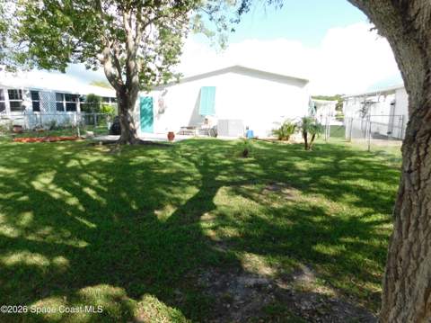 809 Tamarind Circle, Barefoot Bay FL - photo 10 of 13