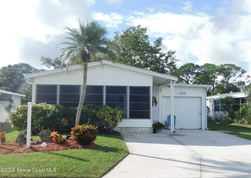 2 bedroom Manufactured Home at 809 Tamarind Circle, Barefoot Bay Unit 1, Barefoot Bay — photo 2