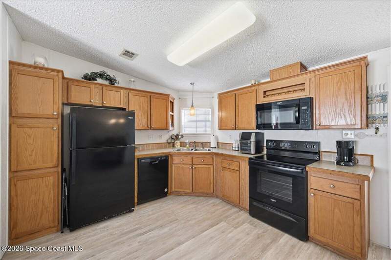 2 bedroom Manufactured Home at 1145 Wren Circle, Barefoot Bay Unit 2 Part 10, Barefoot Bay — photo 4