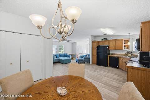 1145 Wren Circle, Barefoot Bay FL - photo 7 of 34