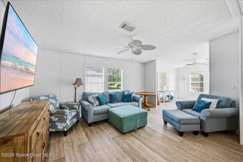 1145 Wren Circle, Barefoot Bay FL - photo 9 of 34