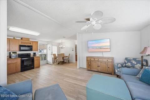 1145 Wren Circle, Barefoot Bay FL - photo 12 of 34
