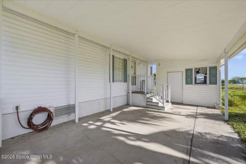 1145 Wren Circle, Barefoot Bay FL - photo 24 of 34