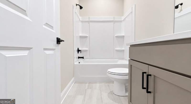 4 bedroom Single Family Residence at 389 Grand Wehunt Drive, Wehunt Meadows, Hoschton — photo 5