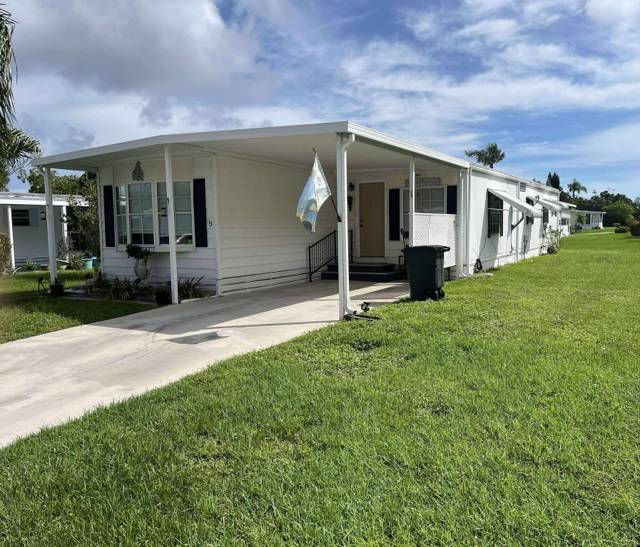 15 La Costa Lane home for sale in Spanish Lakes Golf Village