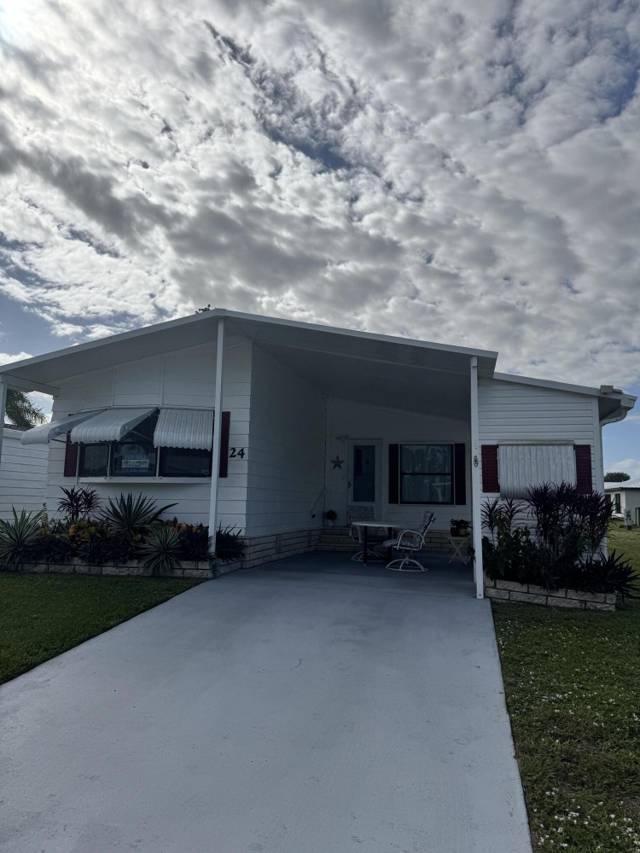 24 Villa Del Norte home for sale in Spanish Lakes Country Club Village