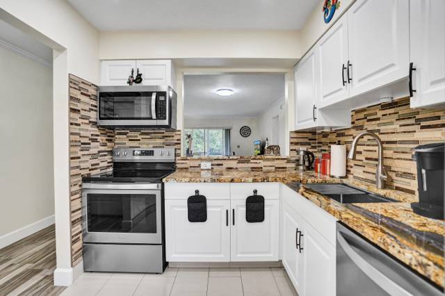 140 Lake Meryl Drive #140 home for sale in Golden Lakes Village Condo E