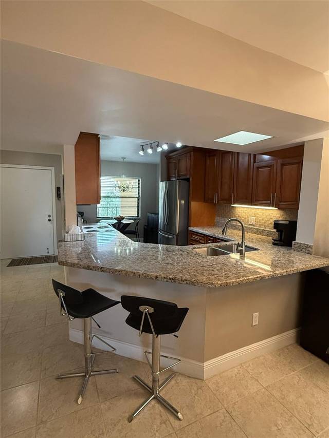 23380 Carolwood Lane #408 home for sale in Pines Of Boca Barwood