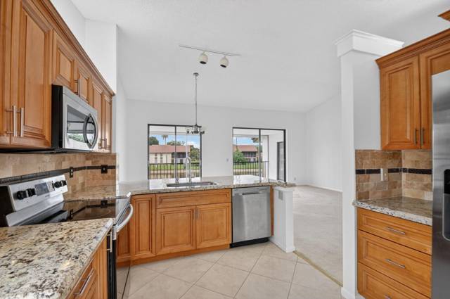 10231 N Circle Lake Drive #201 home for sale in Palm Chase Lakes Condo