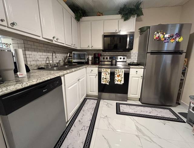 300 NE 26th Avenue #113 home for sale in Village Royale Greenhill