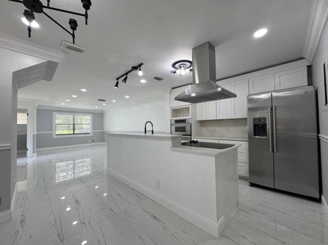 613 NW 47TH Street home for sale in Villager Townhomes