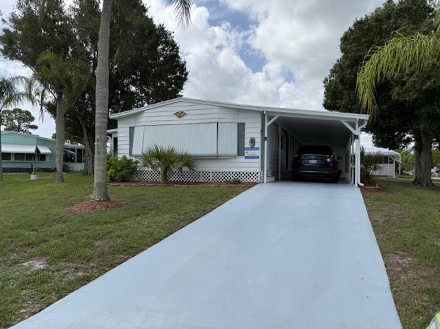 2 Jose Martin home for sale in Spanish Lakes Country Club Village
