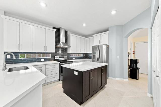 12115 NW 52nd Court home for sale in Wyndham Lakes Central