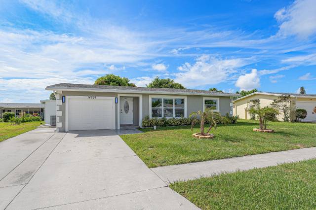 14598 SUNNY WATERS Lane home for sale in Coco Wood Lakes
