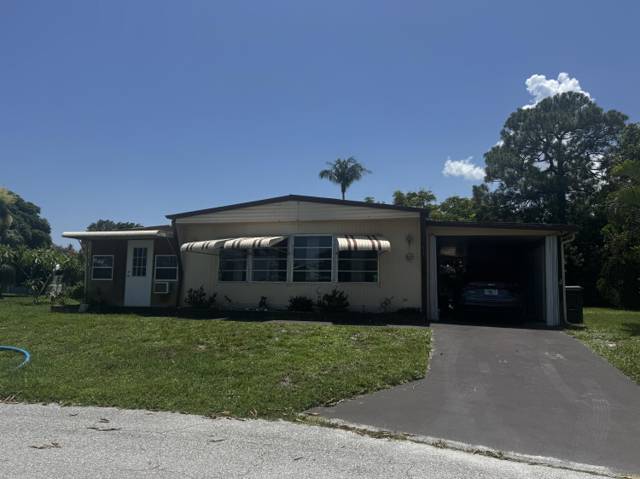6165 N joshua Lane, home for sale in Lantana
