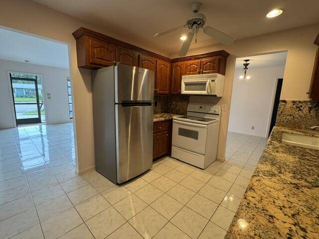 14537 Shadow Wood Lane home for sale in Coco Wood Lakes