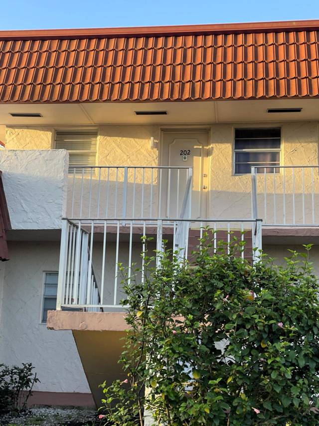 12011 Poinciana Boulevard #202, home for sale in Royal Palm Beach