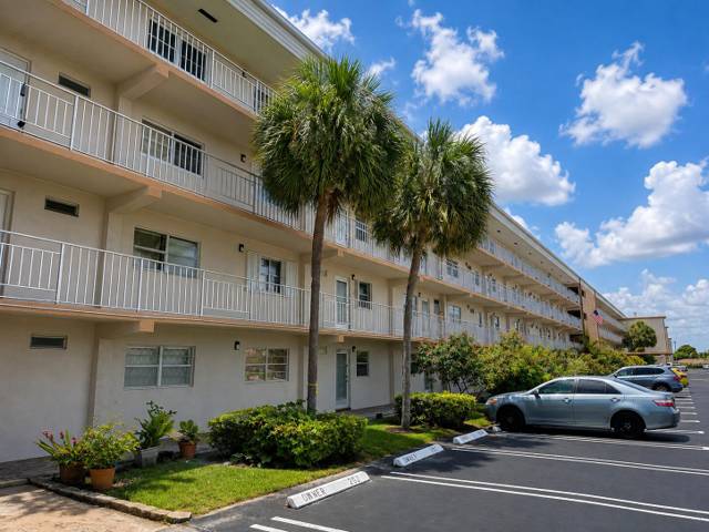 230 NE 26TH Avenue #404 home for sale in Village Royale On The Green Condo