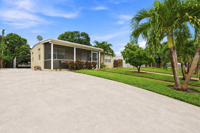 560 Seagrape Road, home for sale in Lantana