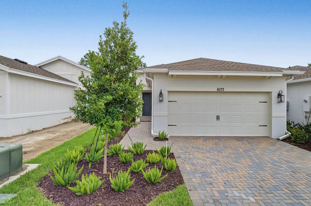 6173 NW TUCKAWAY Avenue #169 home for sale in Four Seasons at Wylder