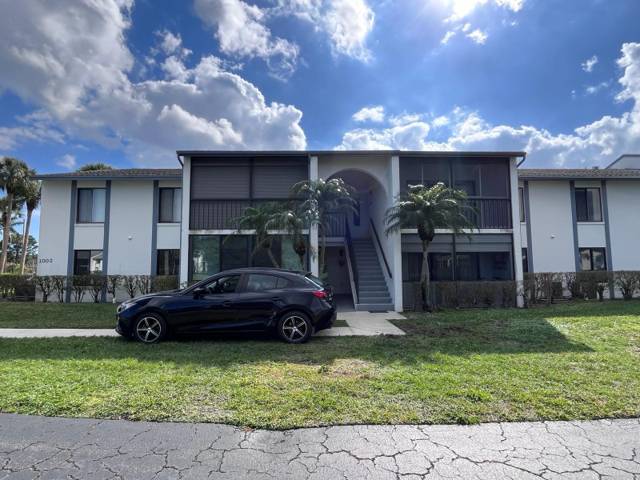 1002 Green Pine Boulevard #F2 home for sale in Palm Club Village