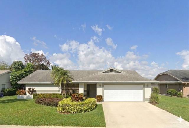 142 PARKWOOD Drive, home for sale in Royal Palm Beach