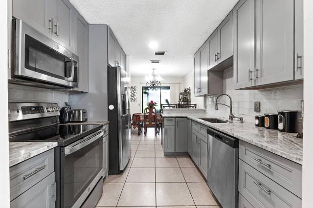 1595 Woodbridge Lakes Circle, home for sale in West Palm Beach