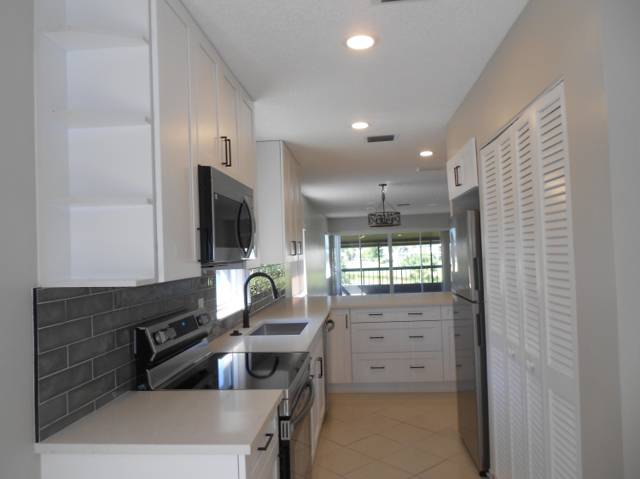 13809 Royal Palm Court #B home for sale in Palm Greens At Villa Del Ray Condo