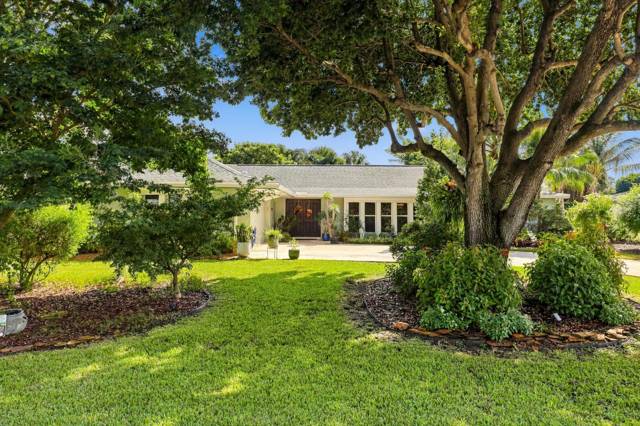 9714 HONEYSUCKLE Avenue, home for sale in Palm Beach Gardens