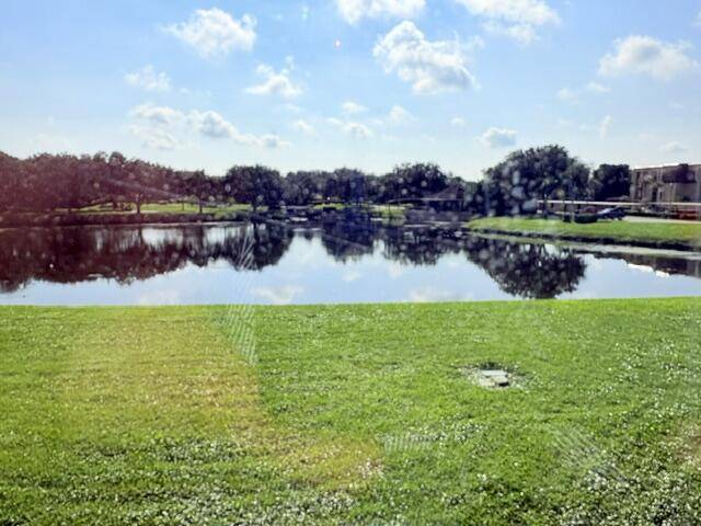5380 WOODLAND LAKES Drive #216, home for sale in Palm Beach Gardens