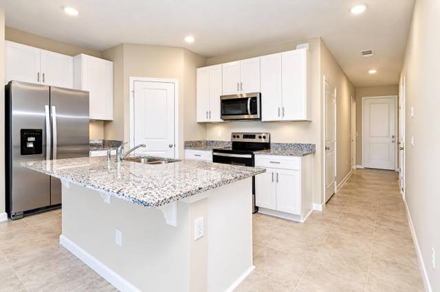 5648 MENTMORE Drive, home for sale in Mangonia Park