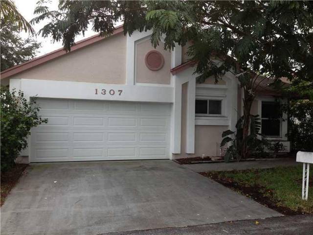 1307 E Glen Oak Road, home for sale in North Lauderdale