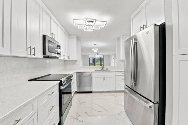 15324 LAKES OF DELRAY Boulevard #105, home for sale in Delray Beach