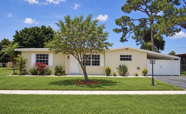1903 E CHATHAM Road, home for sale in West Palm Beach