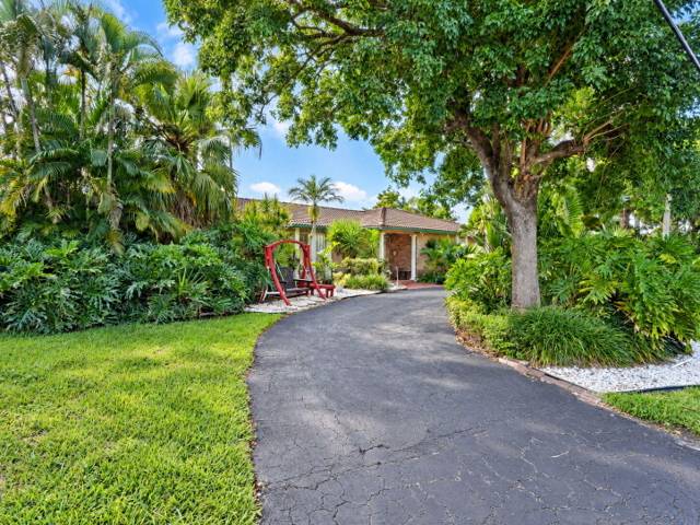 937 W Tropical Way, home for sale in Plantation
