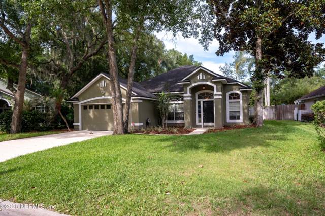 1673 TALL TREE Drive home for sale in The Woods
