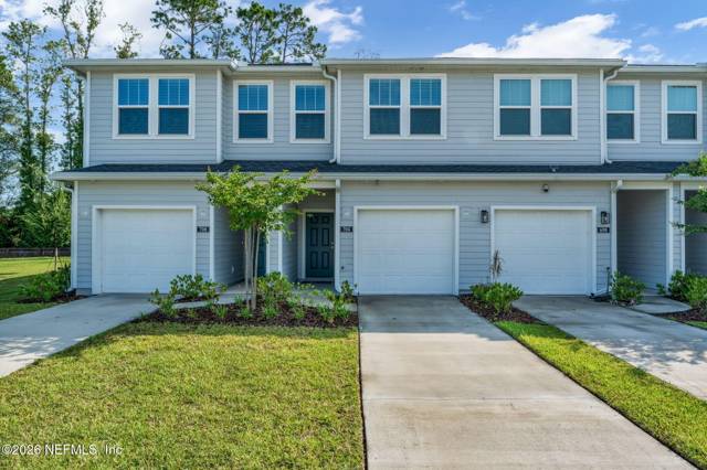 704 HOLLY LAKES Drive home for sale in Townhomes of Holly Cove