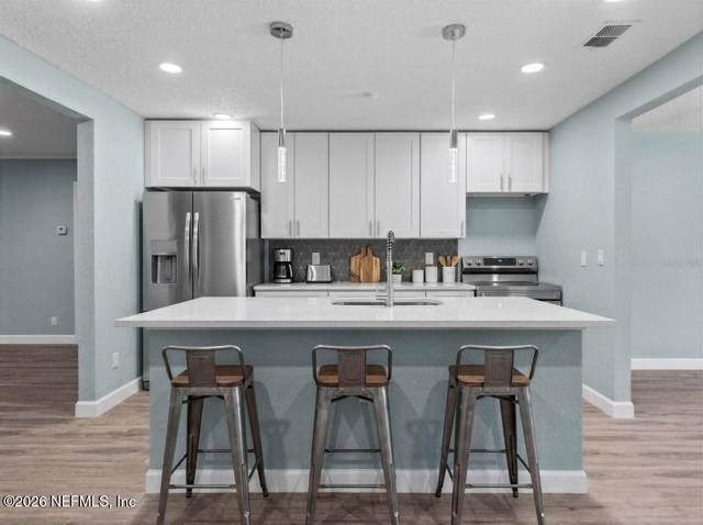 7427 JOHN F KENNEDY Drive home for sale in Washington Lake Estates