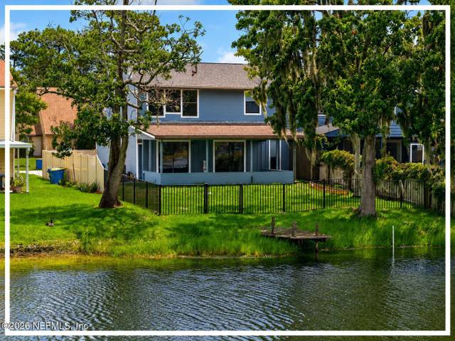 11648 FT CAROLINE LAKES Drive home for sale in Fort Caroline
