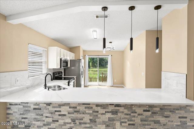 1454 COVE LANDING Drive, home for sale in Jacksonville