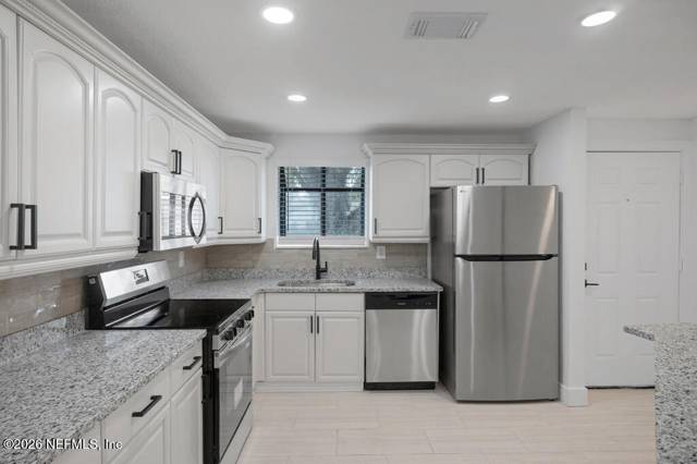 2668 SUNRISE VILLAGE Drive #B, home for sale in Orange Park