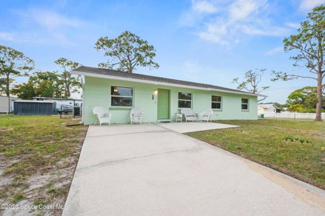 6450 Ember Avenue home for sale in N Port St John