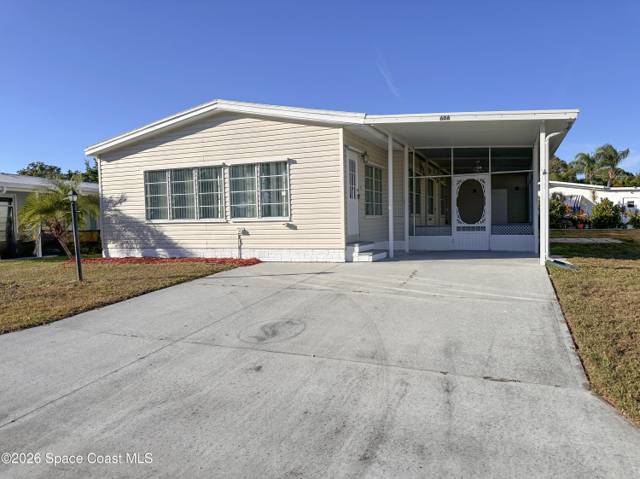 606 Dolphin Circle, home for sale in Barefoot Bay